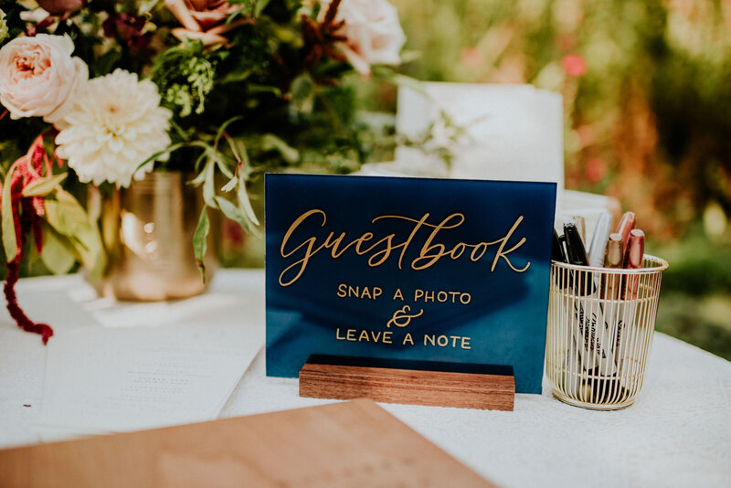 Navy and gold guestbook sign