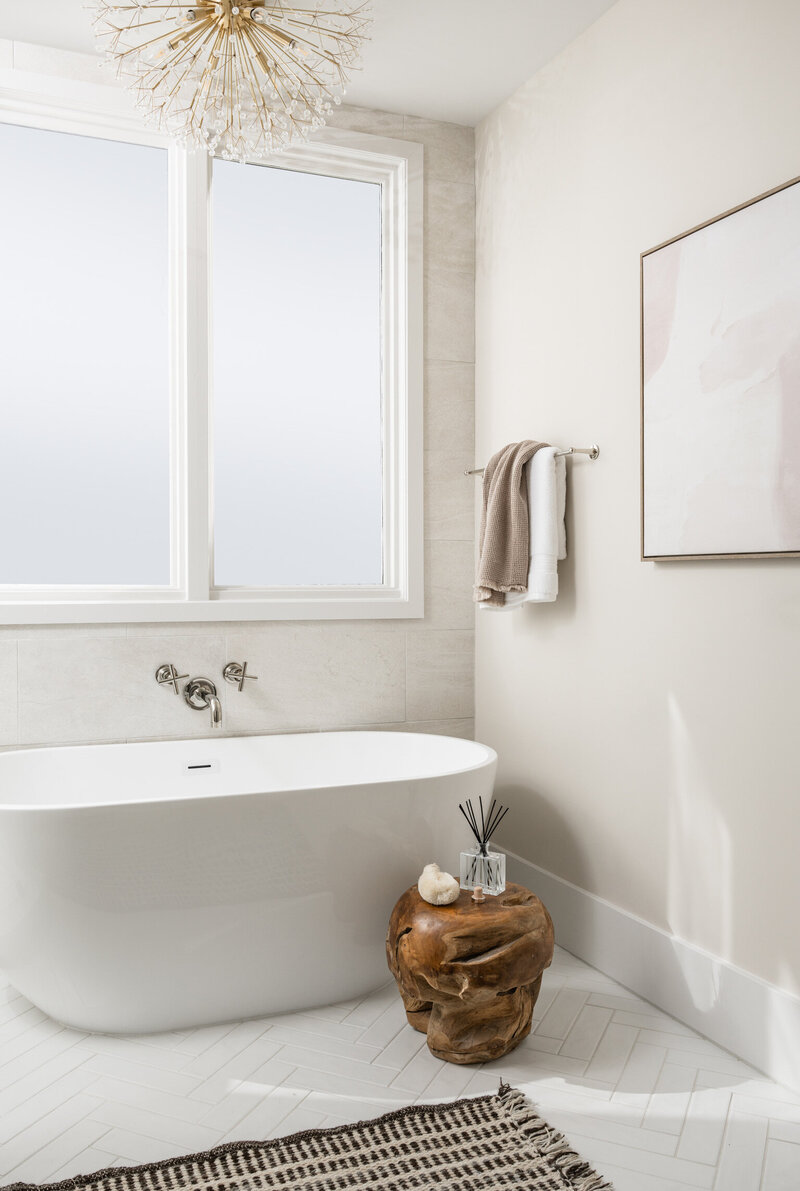 bath tub in front of window
