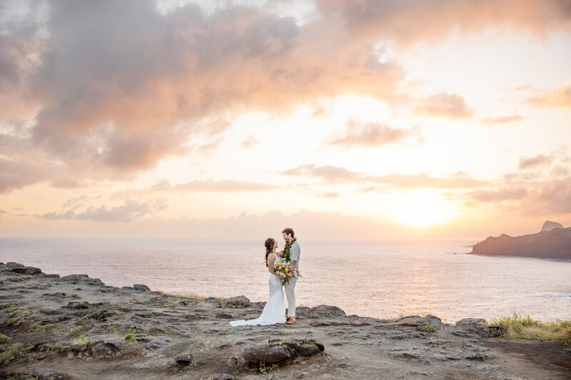 Maui Elopement Photographer captures black sand beach hawaii wedding sunset bridals
