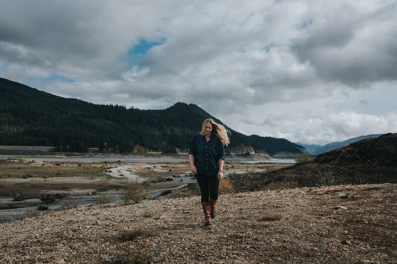 Snoqualmie based documentary wedding and elopement photographer, Erin Aasland, walking thru the mountains in the Cascades
