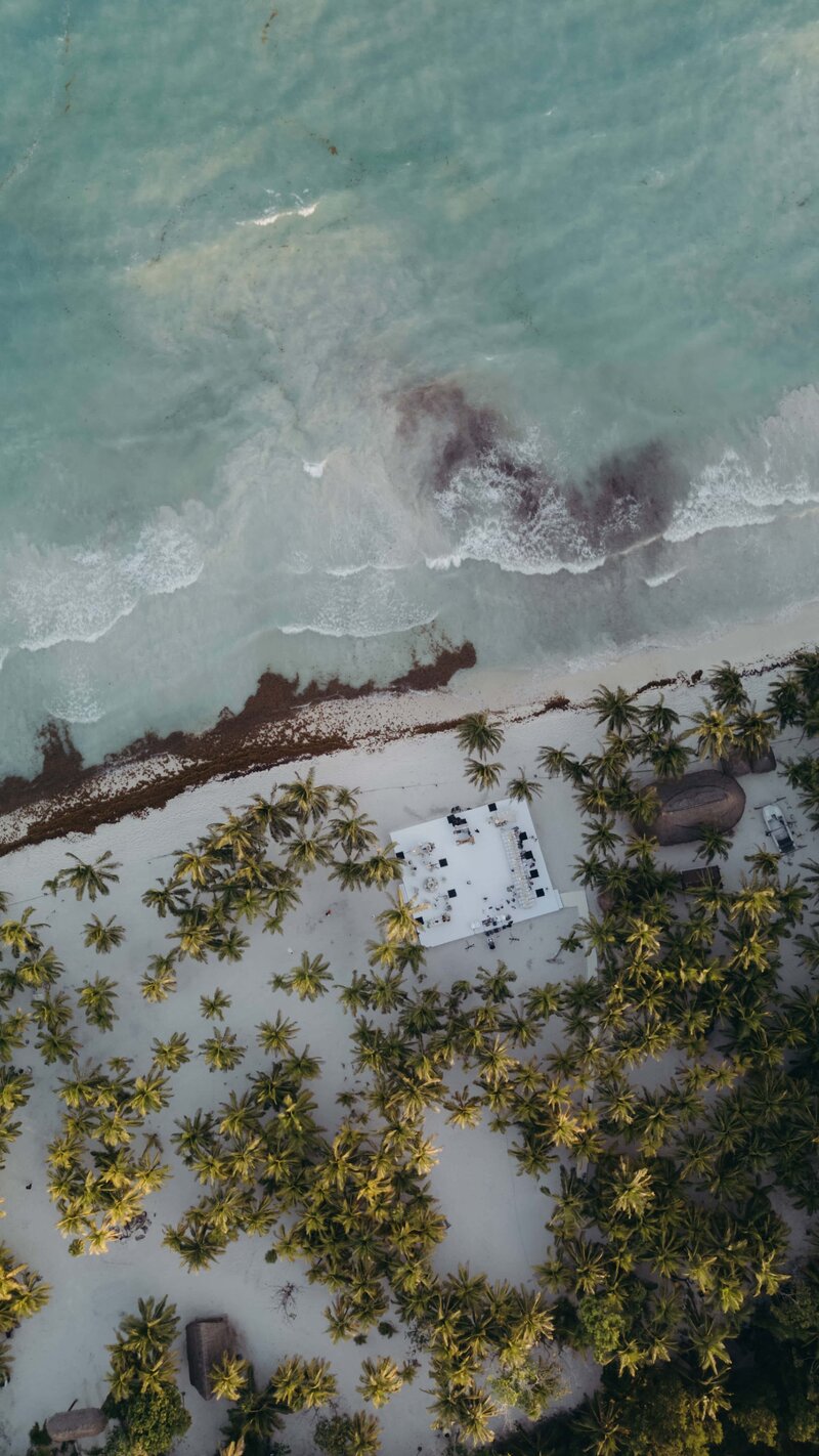 Drone photo of a Tulum wedding at the oceanfront taken by MemoryBox