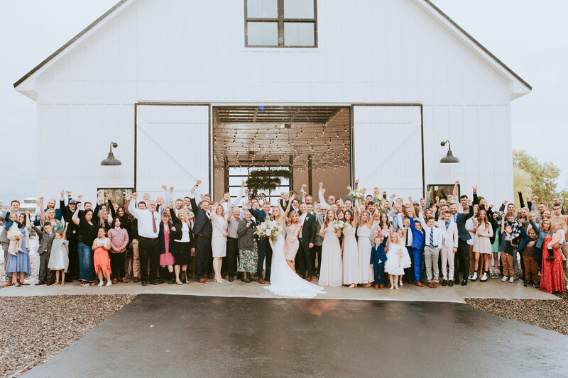 Everyone, huge family, out in front of White Barn.