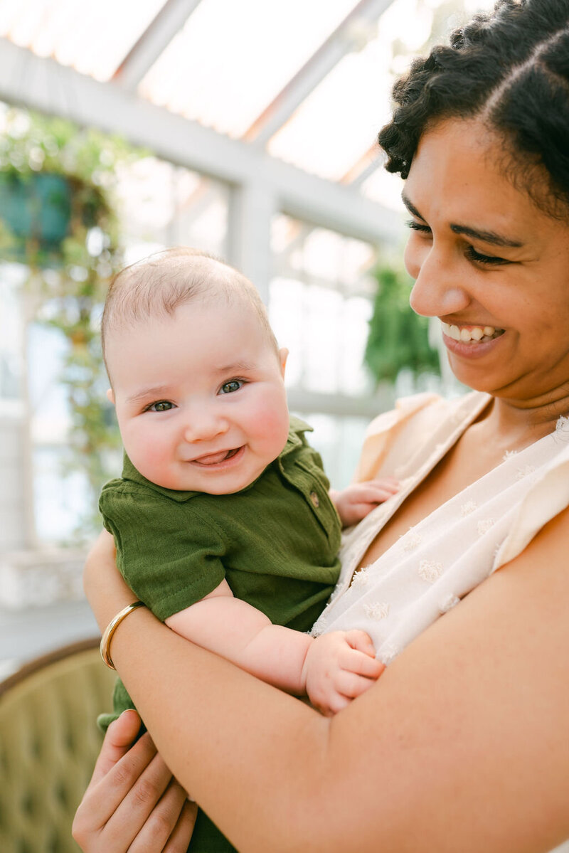 09-Candid-Baby-Smiling-Mother-Greenhouse