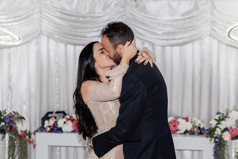 bride and groom embrace during elopement in las vegas
