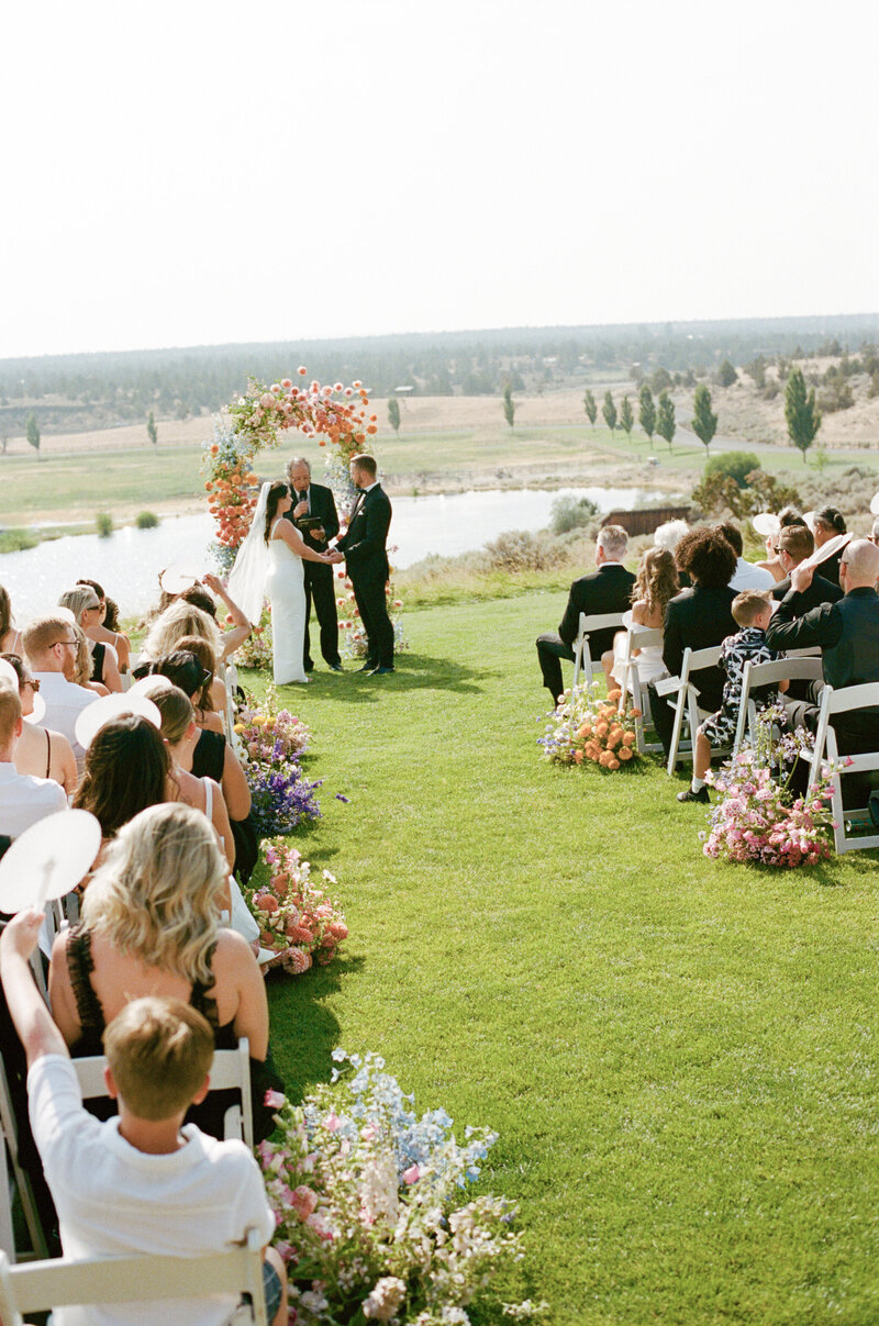 Bride and her daughter walking at Brasada Ranch in Bend