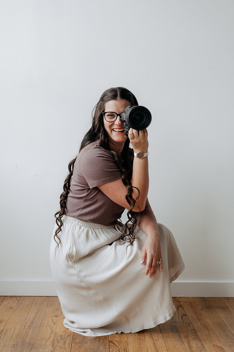 rachel boyd poses for a photo during a branding photoshoot