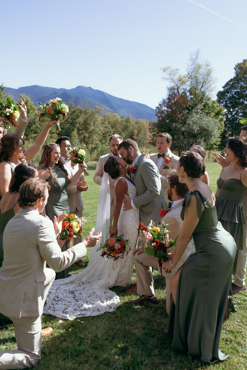 Wedding Photographer Vermont | Sincerely Liz Photography Documentary Wedding, Engagement, Elopement, Maternity and Newborn Photographer in New England | Bride and groom holding hands while walking at the aisle