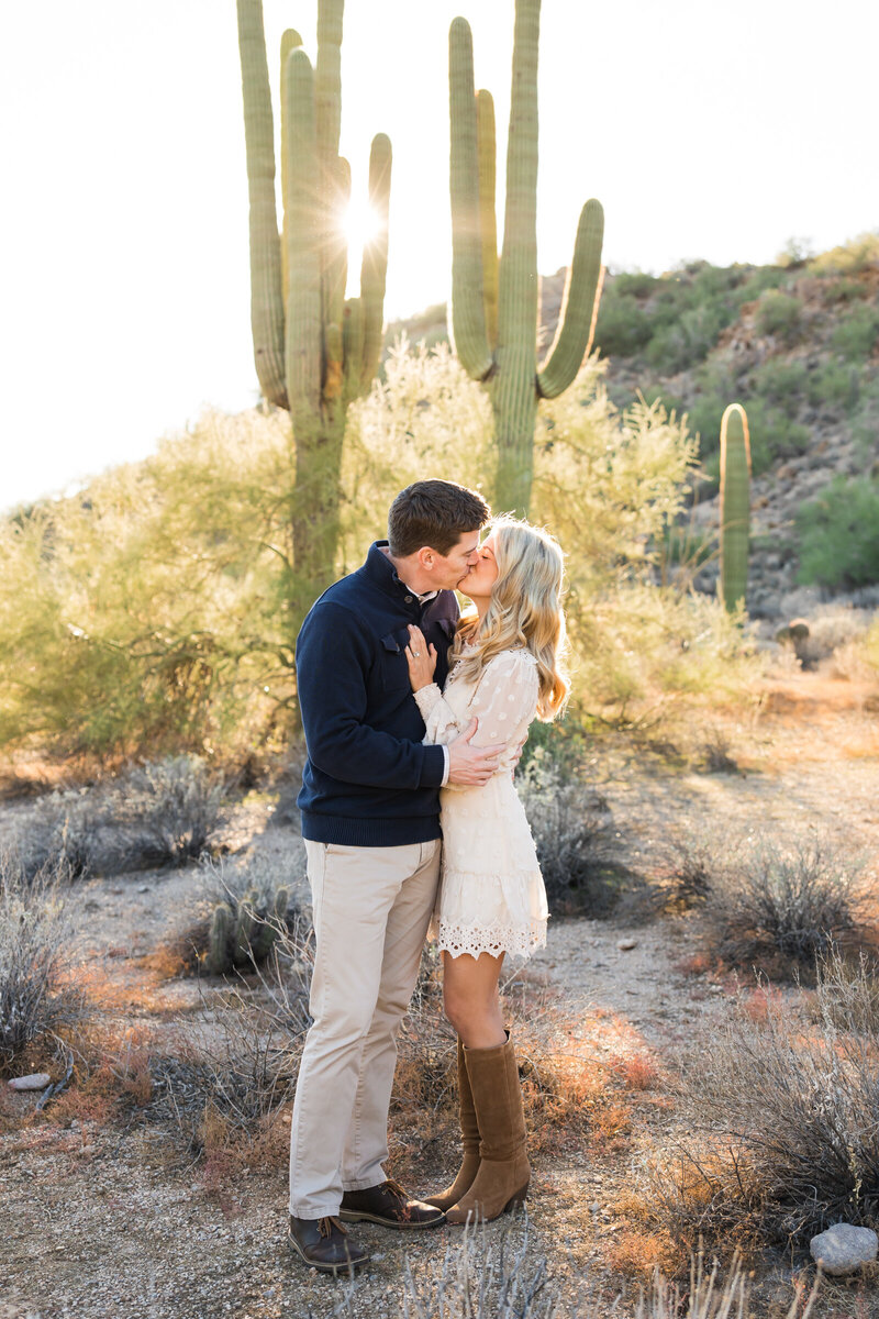 couple kissing in the Arizona desert