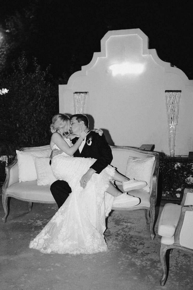 Black and white portrait of newlyweds at their Houston wedding reception