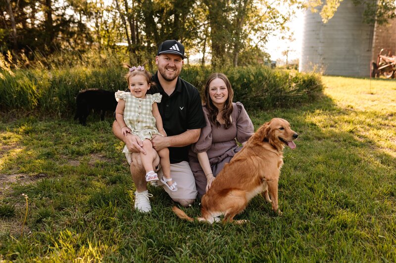 McKenna Fahrenbruch, digital marketing expert at Graceful Exposure Media, enjoying time with her husband, daughter, and family dog—highlighting the heart behind her small, family-owned creative business.