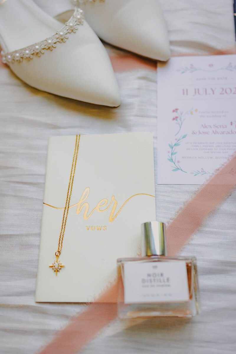 wedding details of shoes and invitations