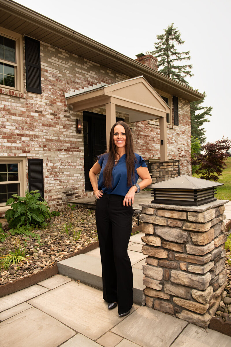 Shari Casanova Home Staging Mentor posed photo in front of home
