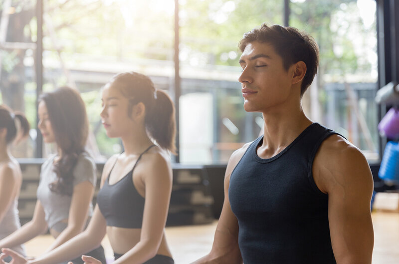 People in a yoga and meditation class
