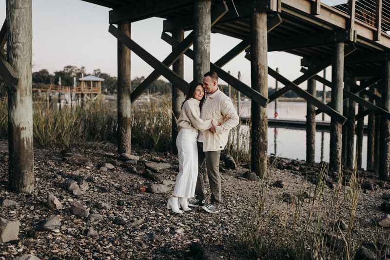 engagement session beneath pier in old town buffton