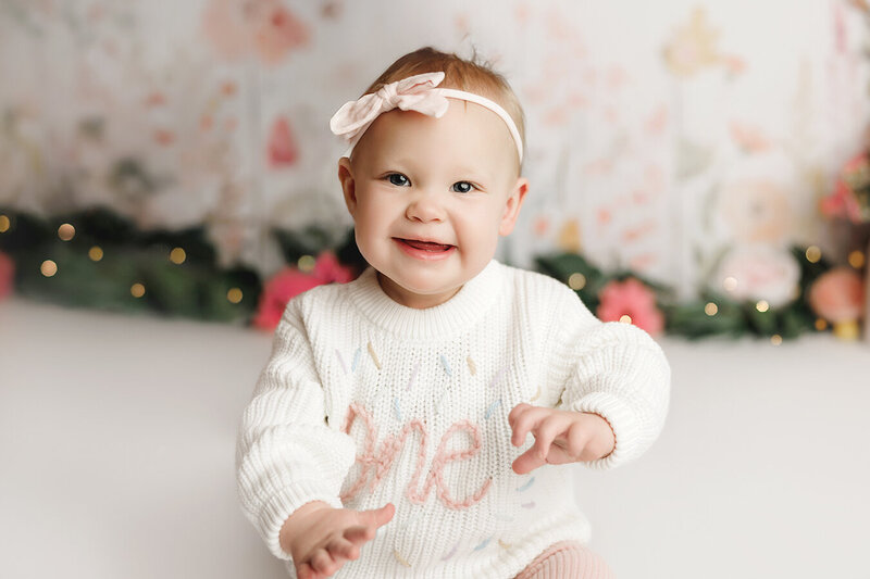 Cutest one year old baby girl with pretty smile