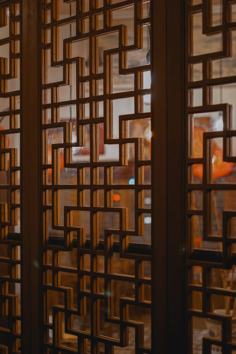Doors with Chinese-inspired architectural wooden pattern