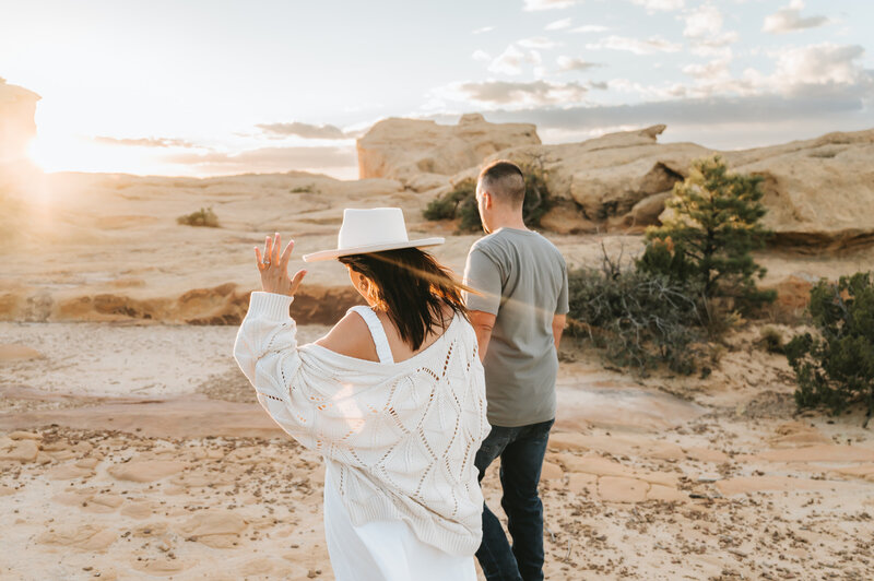 man hugging woman from behind