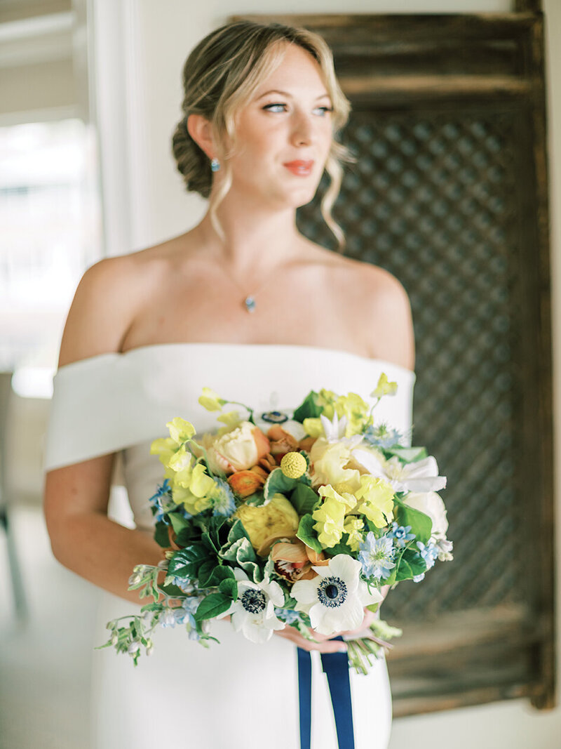 yellow and blue bridal bouquet with anemone