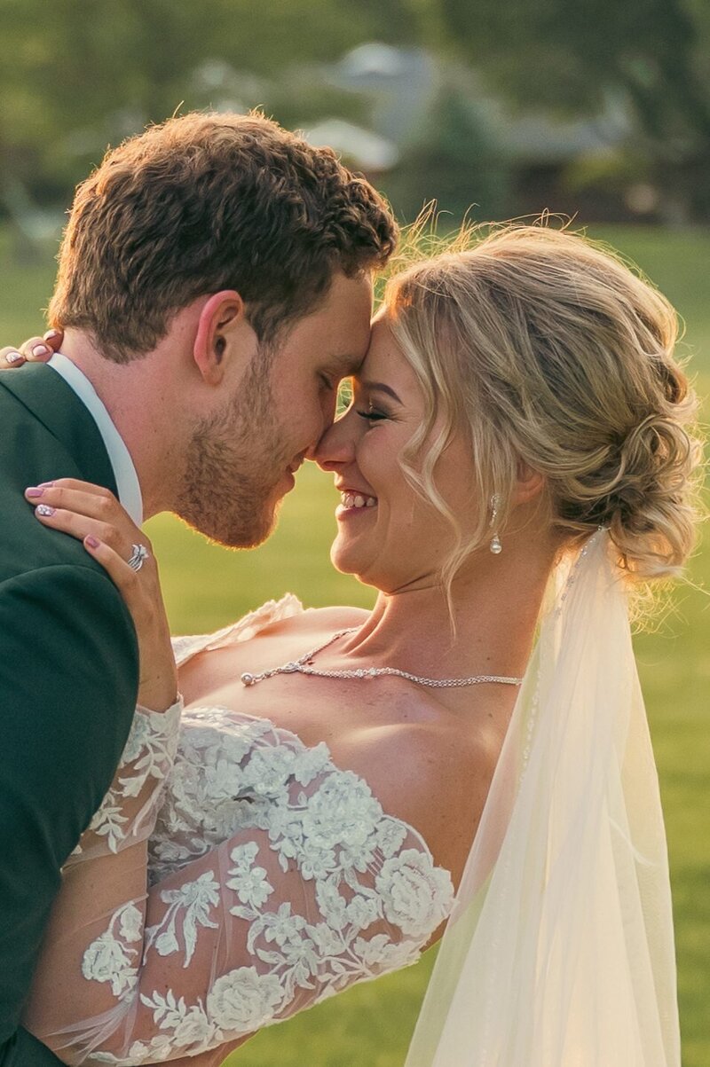 groom dipping bride