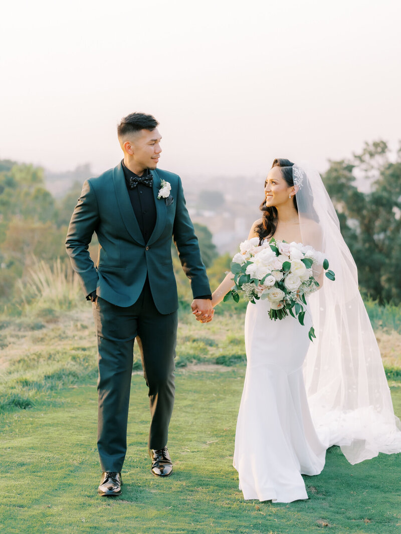 newly wed couple walking together