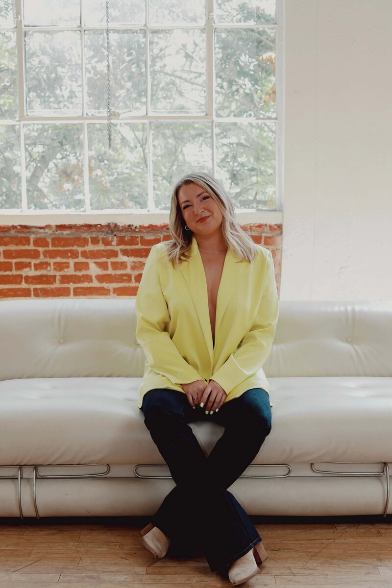Meet the founder of The Aesthetic Edit, a visionary in aesthetic driven marketing and website design, serving salons, spas, makeup artists, and other creatives in San Diego. Her confident gaze reflects her expertise.

