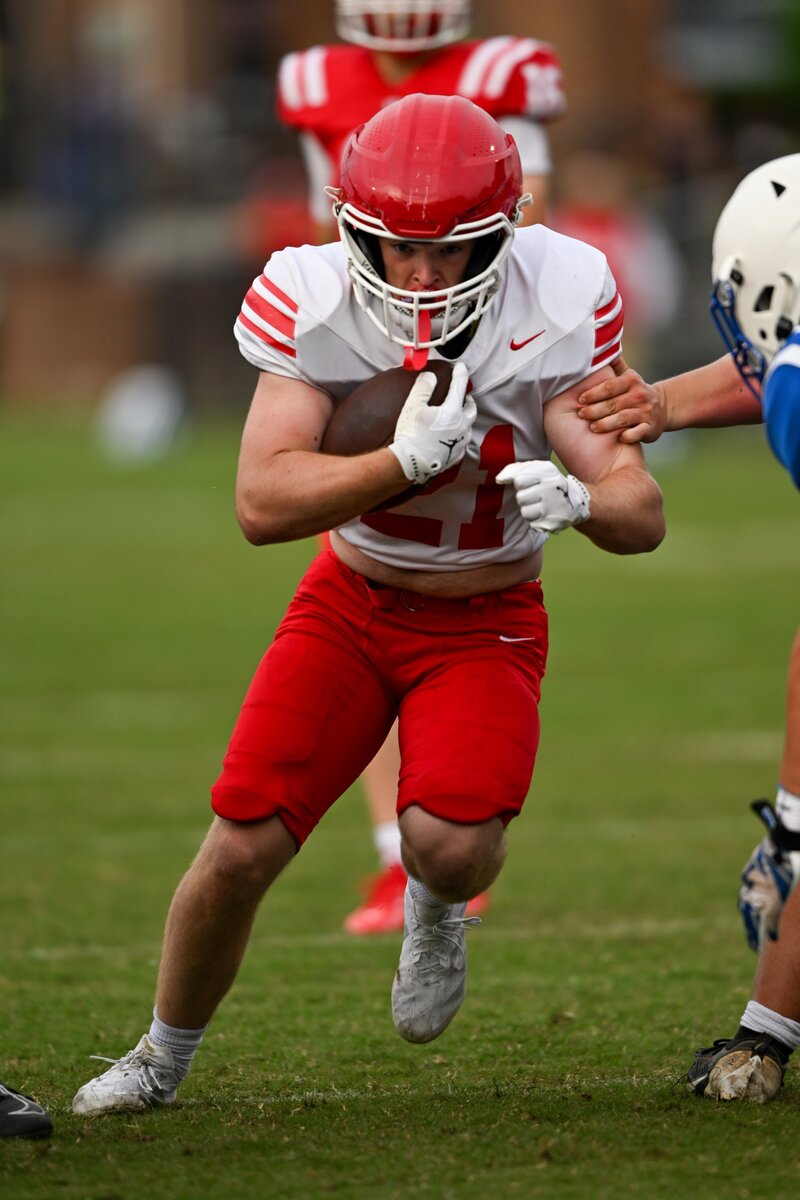 Senior Football Player Action Shot