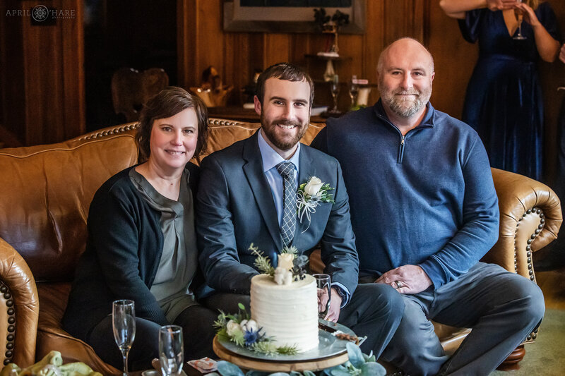 Family Photo on the Couch at Romantic Riversong Inn Estes Park CO