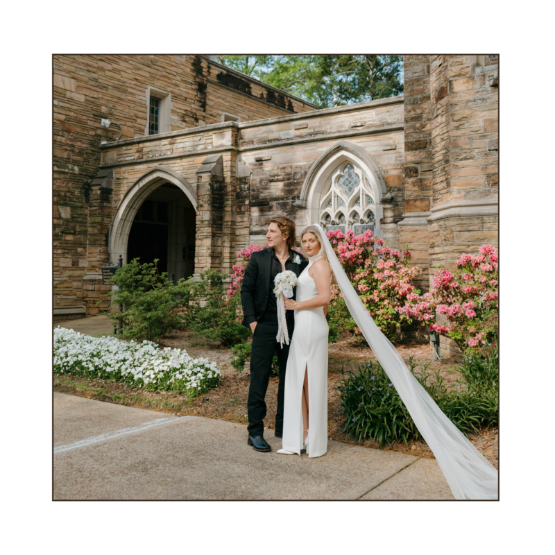 Bride and groom outside historic stone church after their Alabama wedding ceremony — captured by EC Photography