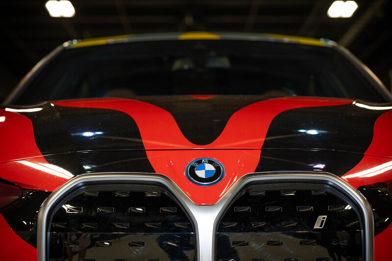 The front of a red and black BMW