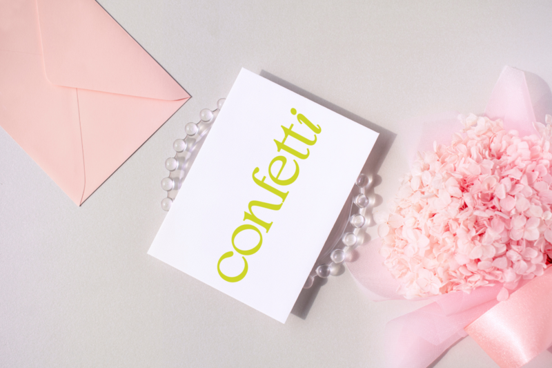 Confetti Coordination business card with pink flowers