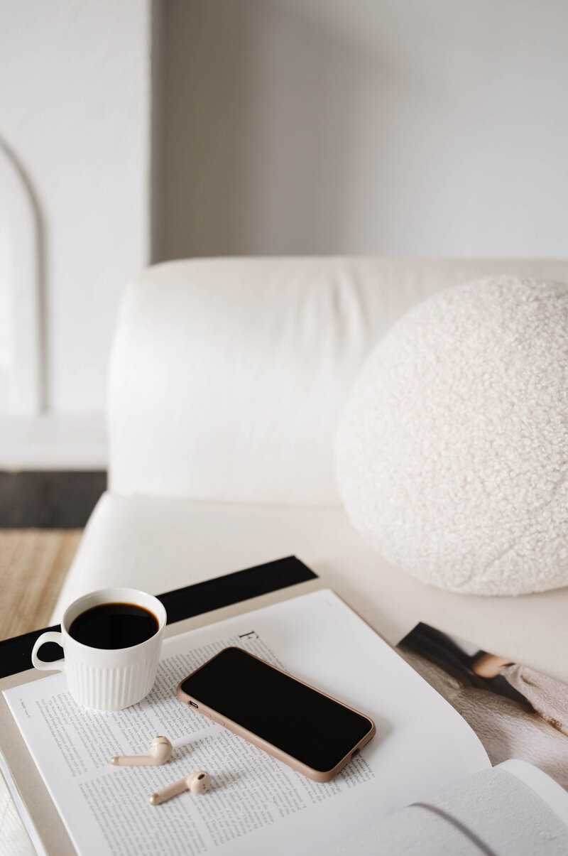 white_chair_with_mobile_phone_coffee_mug