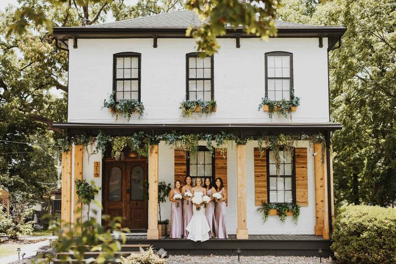 Elegant bridesmaids wear purple dresses