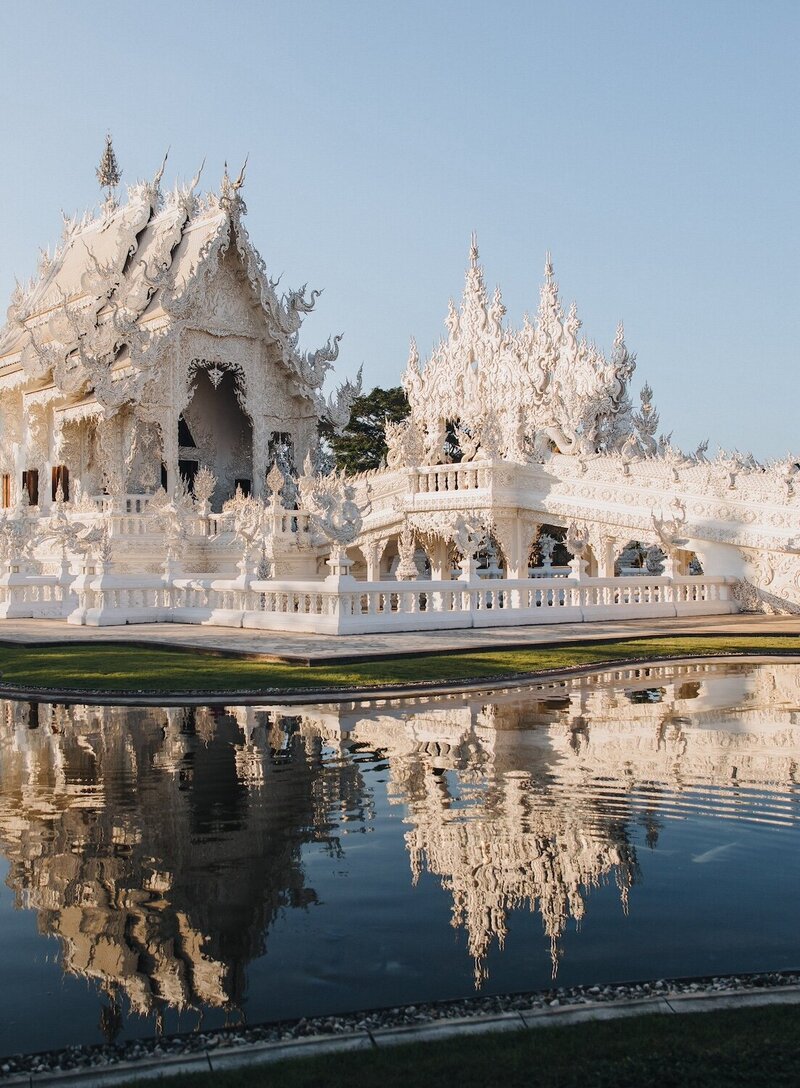 wat-rong-khun-white-temple-reflected-in-water