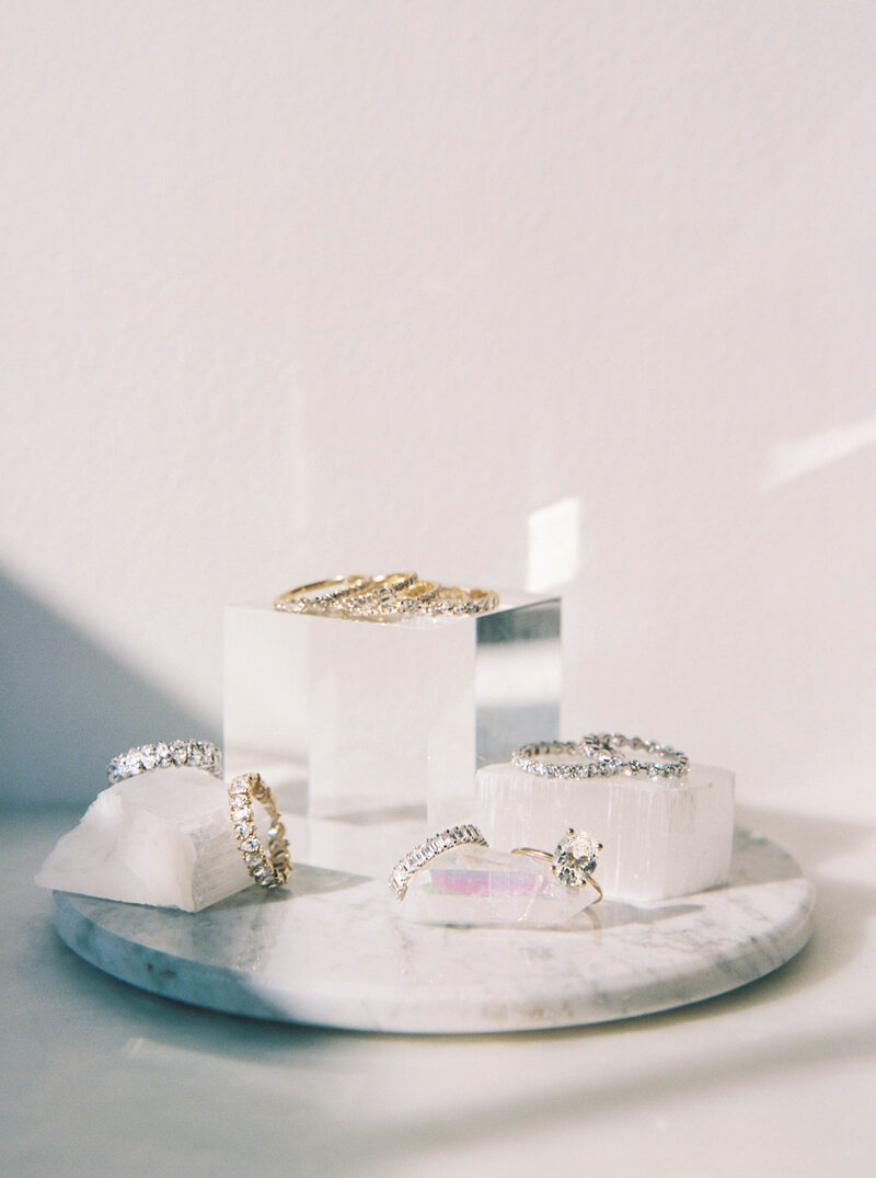 Diamond rings on marble for brand photography