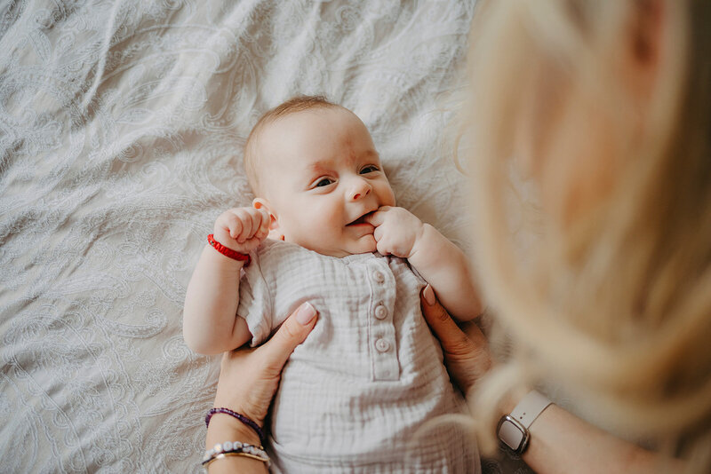 Close-up of a baby on their christening day in Dublin. 