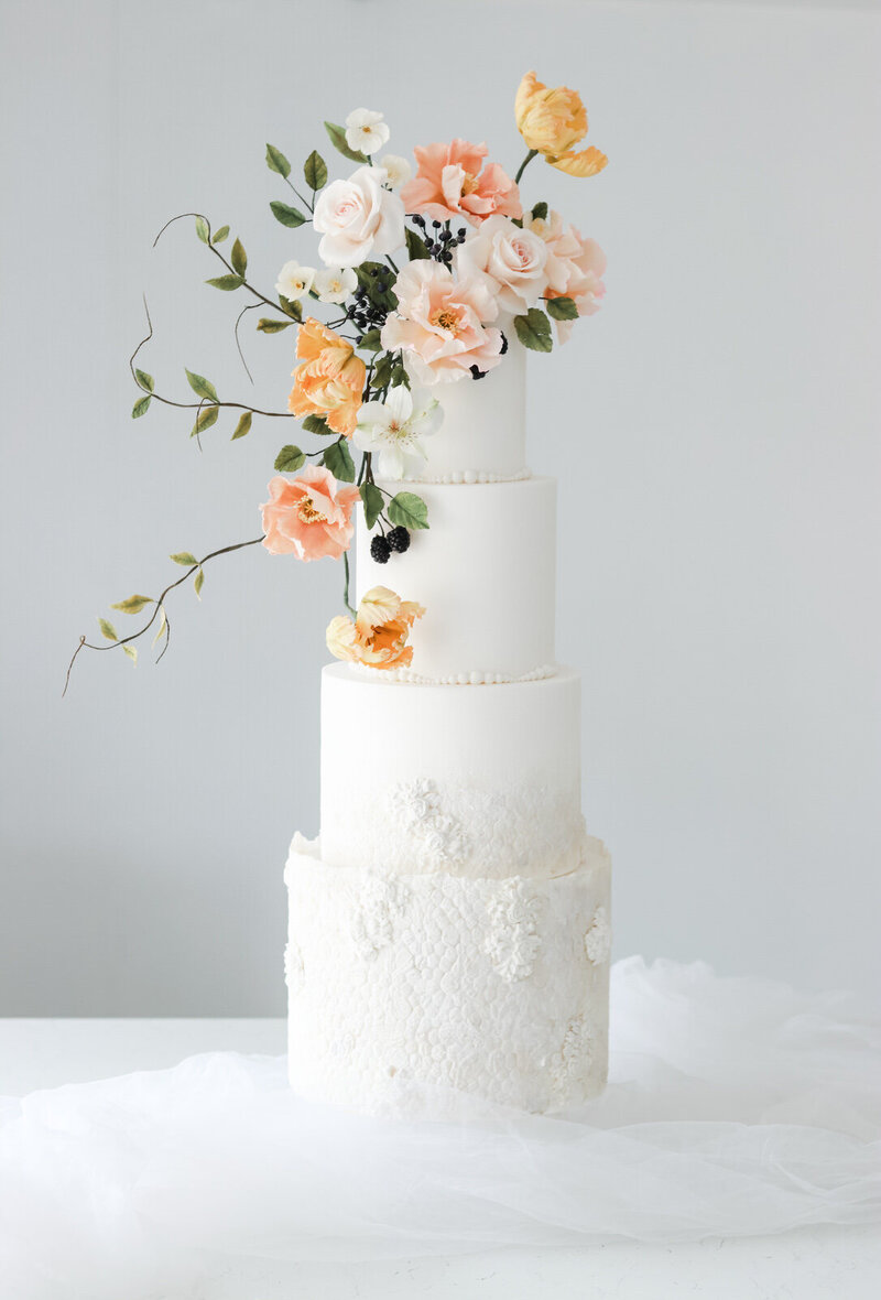 Elegant wedding cake in Hampshire, England with sugar flowers