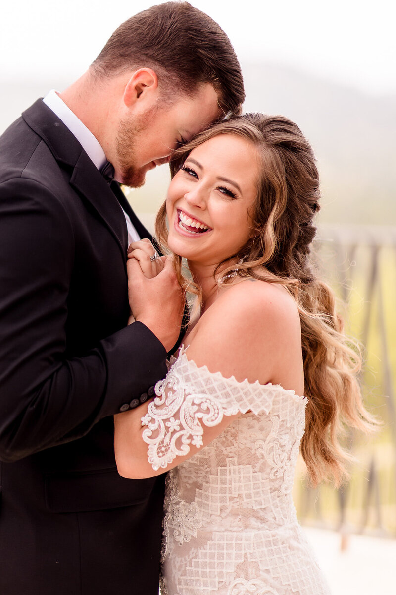 Bride and groom embrace at the Villa Antonia wedding venue in Jonestown, Texas.