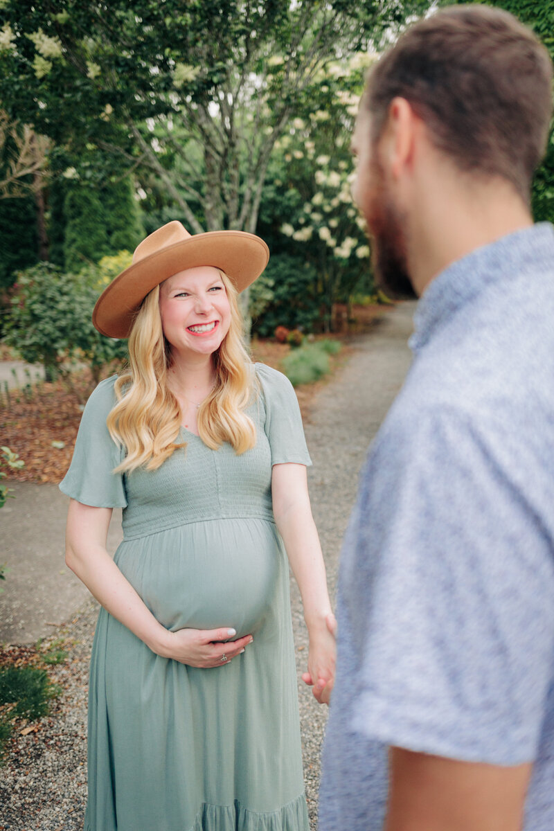 Asheville Maternity Photographer captures pregnant couple at the NC Arboretum