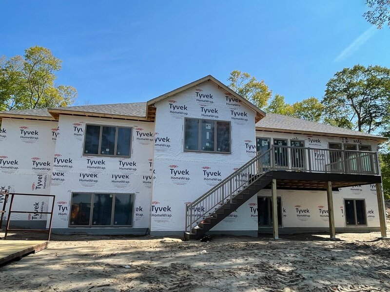 View of residential framing with custom built deck