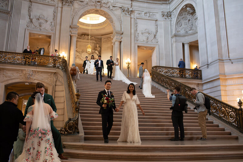 a crowded and busy san francisco city hall