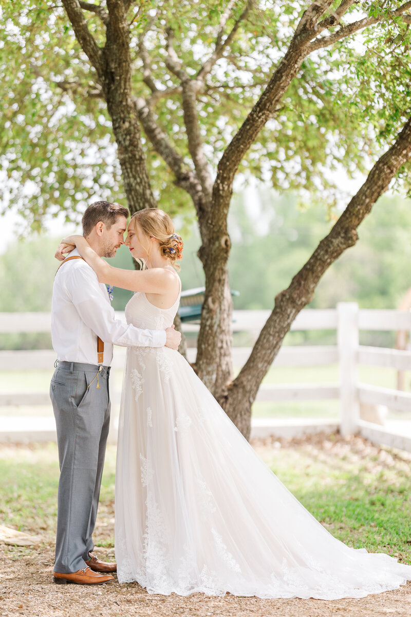 Bride-and-groom-holding-each-other-portrait
