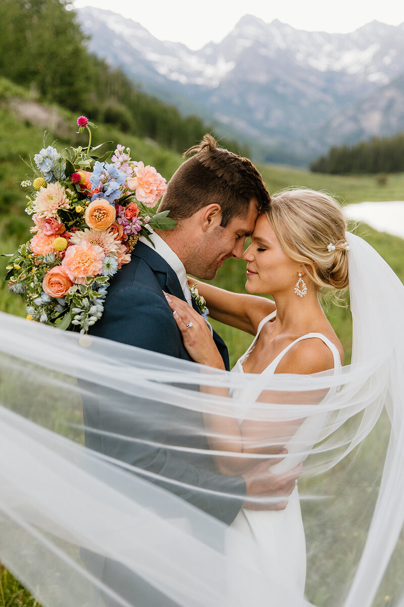 A vibrant, true-to color wedding photo taken at Piney River Ranch. Luxury wedding photography experience