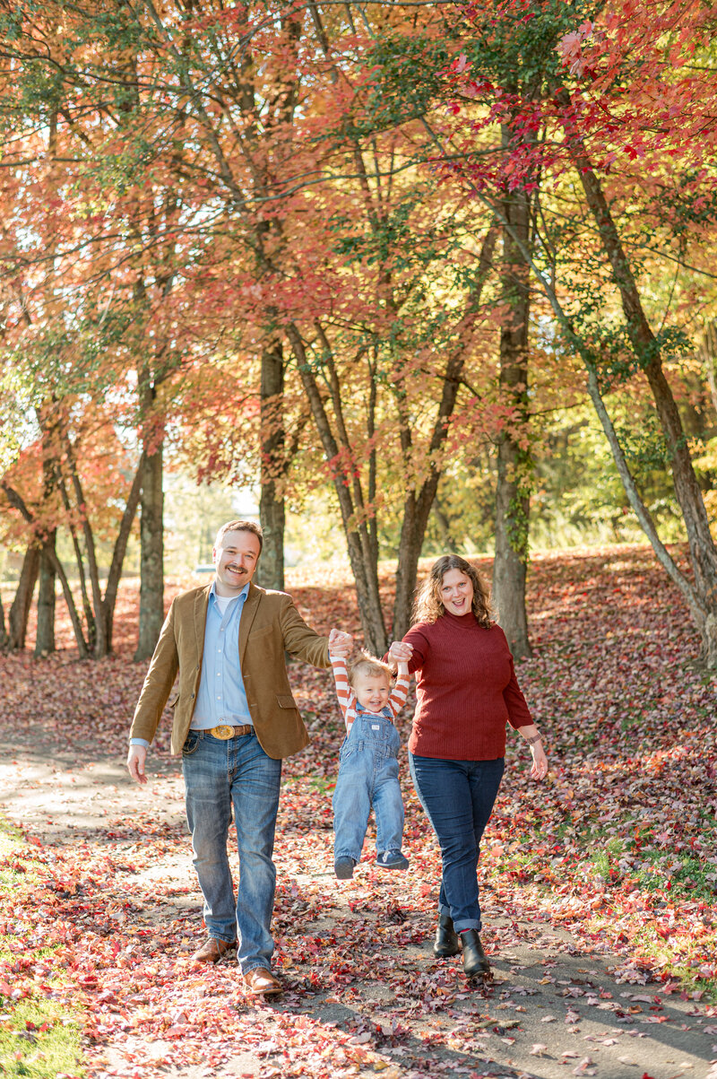 Family photo of Boone, NC based family, wedding and boudoir photographer Ashley Kubota and her husband and son.