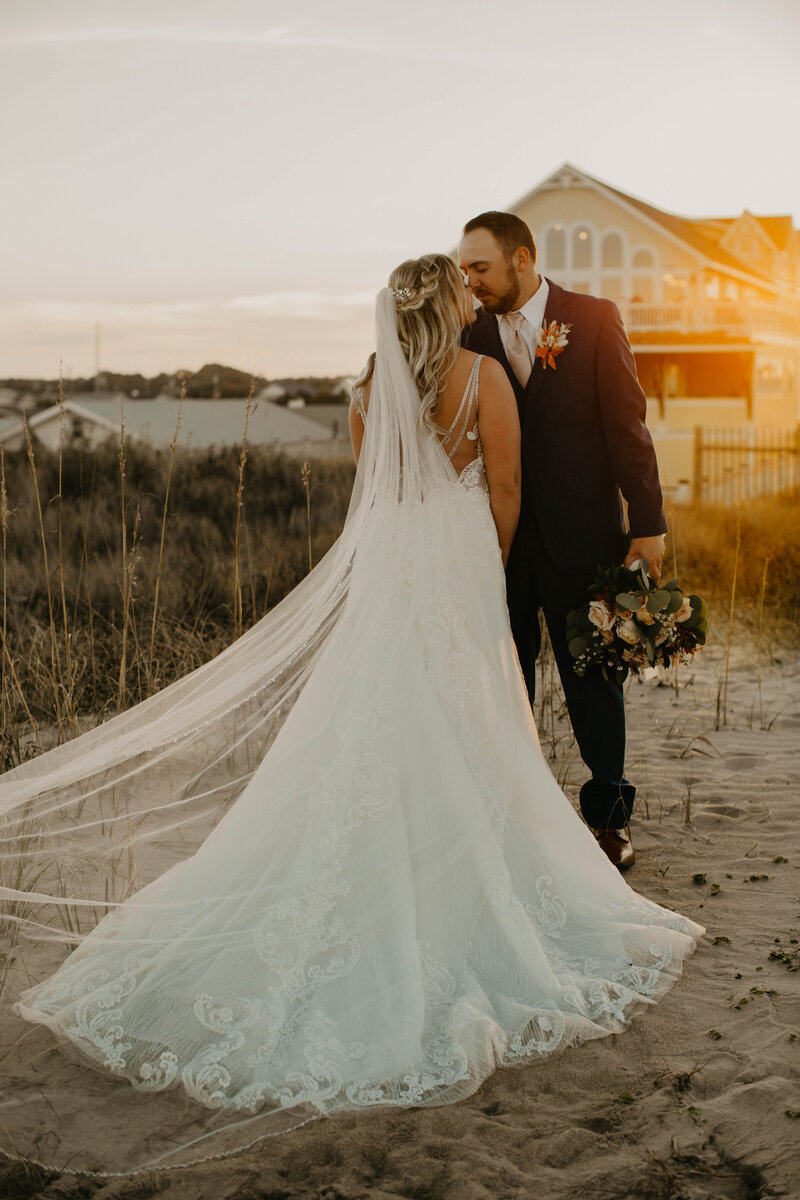 Outer Banks Wedding Elopement Couple Portraits at Sunset on  the Beach