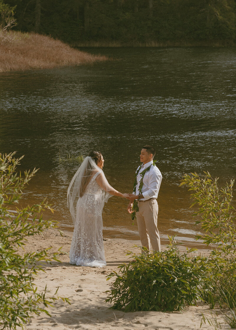 Kourtney and Sage dancing in forest on their elopement day