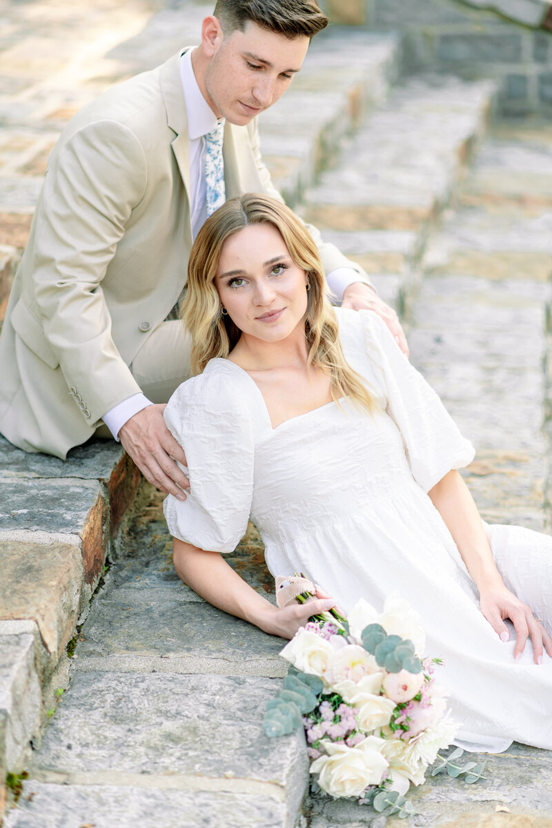 engagement portrait on stairs with light