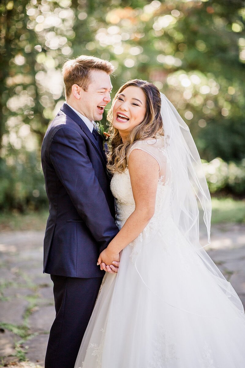 couple laughing by knoxville wedding photographer, amanda may photos