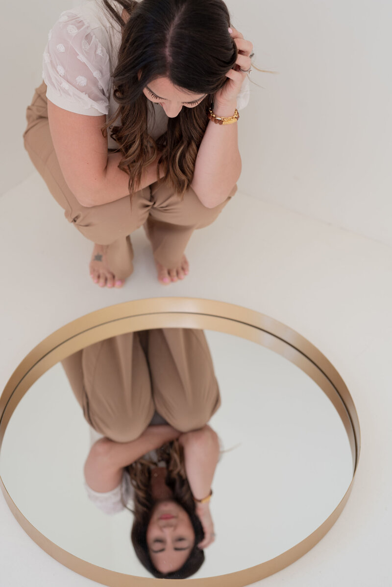 Transformation coach Jessi creating inspiring content on phone for social media