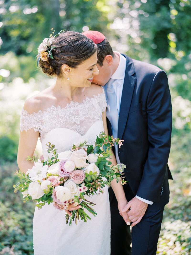 Jewish bride and groom with blush and mauve bridal bouquet