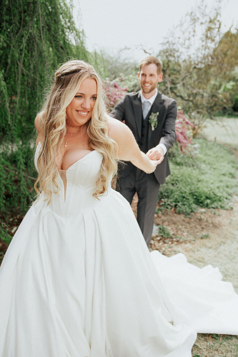 Bride and groom having fun on their wedding day